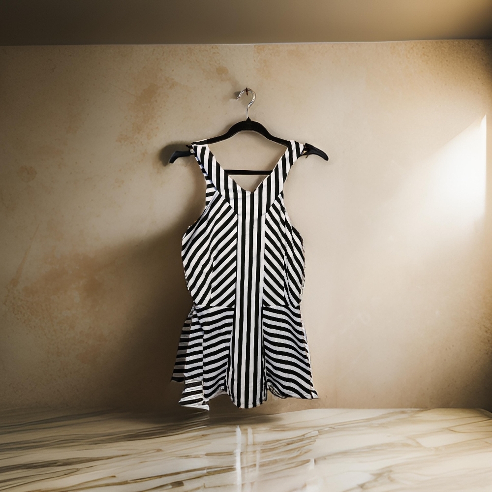 torrid brand sleeveless black and white top. size 12